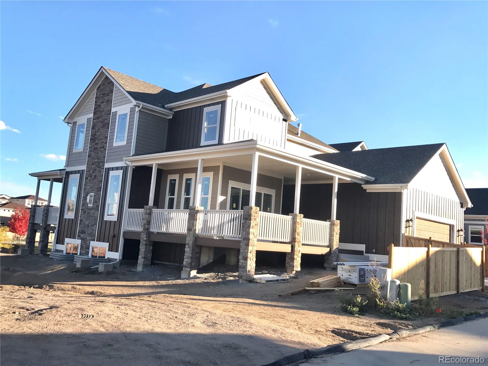 4378 Fell Mist Way Castle Rock, CO 80109 - Photo 8 of 18 a front view of a house with a yard