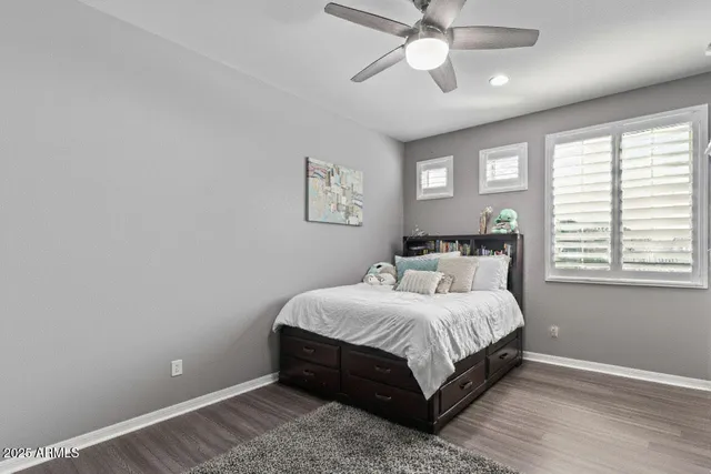 a view of a backyard with sitting area