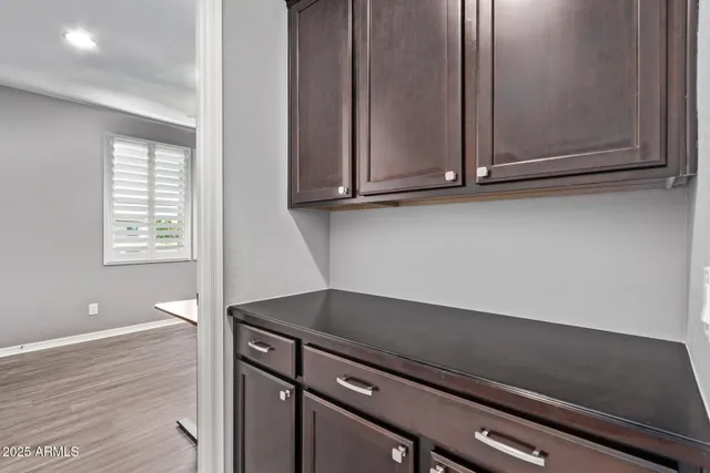 a view of swimming pool with lounge chair and garden