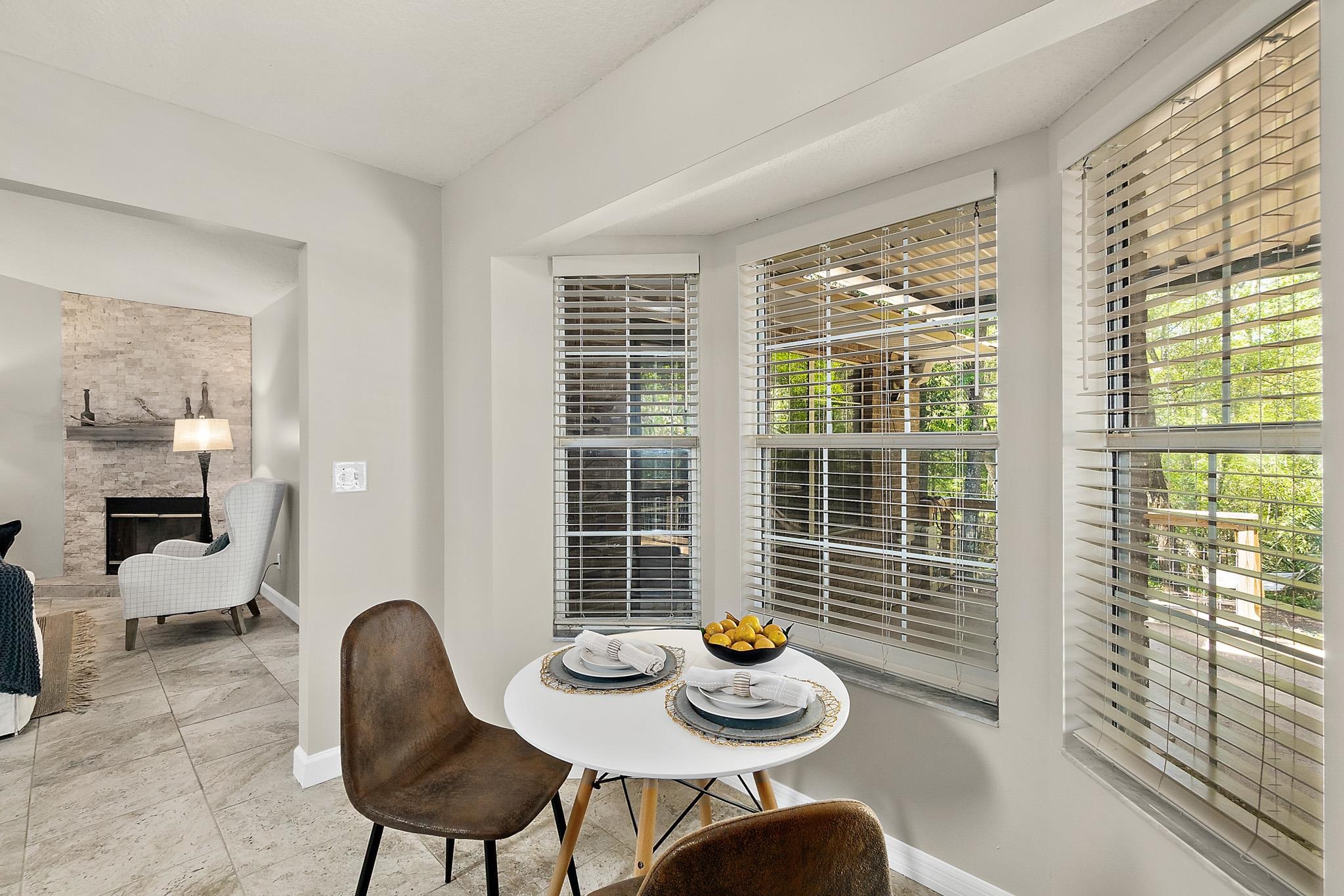 3253 Turtle Creek Road St. Augustine, FL 32086 - Photo 7 of 40 a view of a dining room and livingroom with furniture