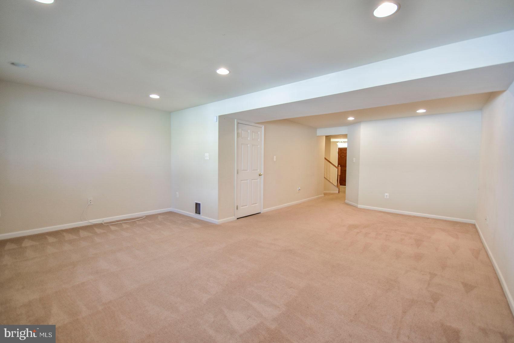 32 Lullwater Way Falling Waters, WV 25419 - Photo 11 of 37 family room & recreation room area - 1st level