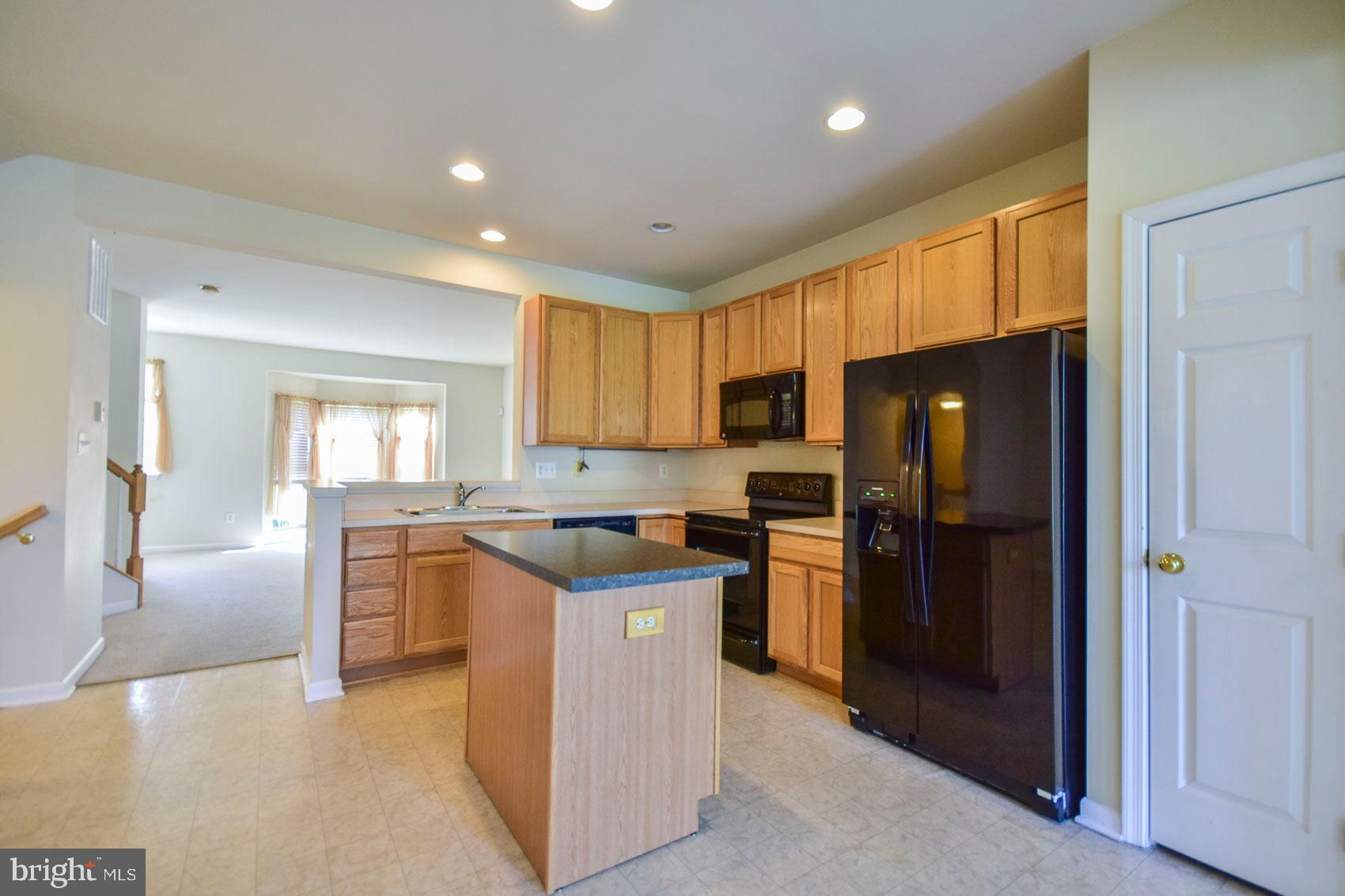 32 Lullwater Way Falling Waters, WV 25419 - Photo 36 of 37 Eat in kitchen and open floor plan