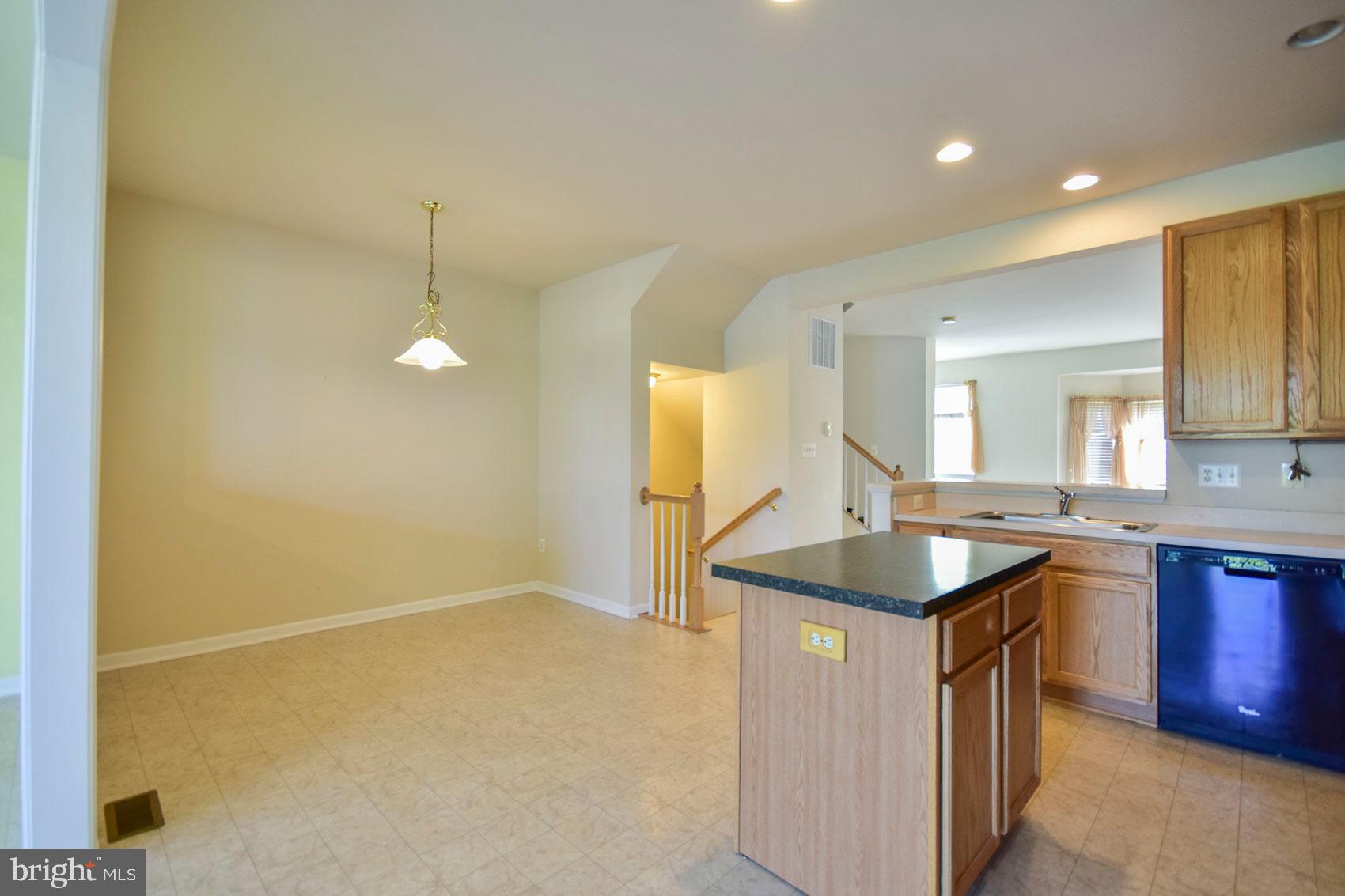 32 Lullwater Way Falling Waters, WV 25419 - Photo 37 of 37 Eat in kitchen and open floor plan