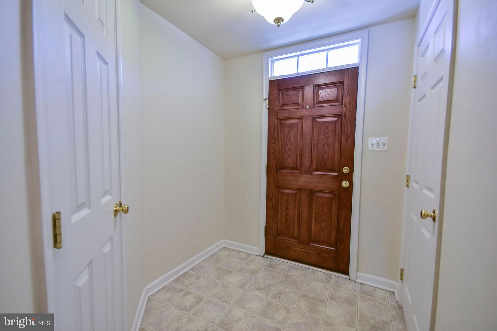 32 Lullwater Way Falling Waters, WV 25419 - Photo 5 of 37 Foyer with half bath