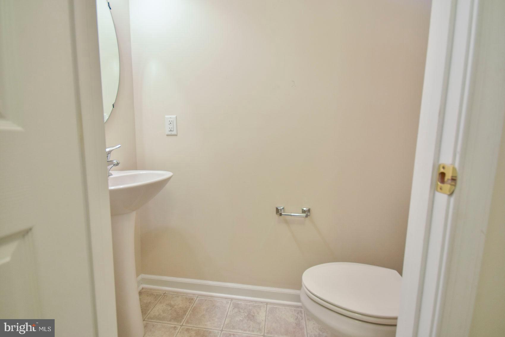 32 Lullwater Way Falling Waters, WV 25419 - Photo 6 of 37 half bath in foyer