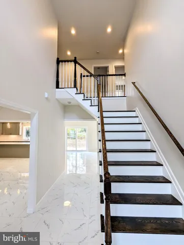 a view of entryway with wooden floor