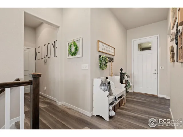 a view of entryway with wooden floor
