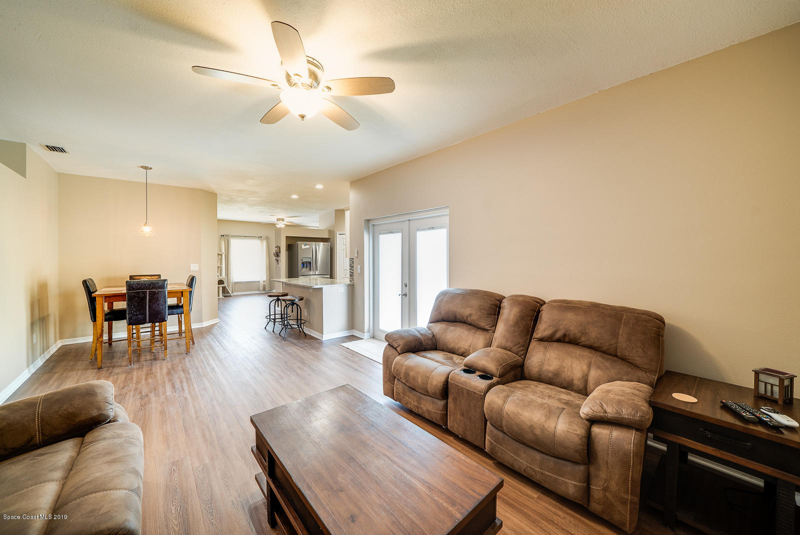 155 Bluff Terrace Melbourne, FL 32901 - Photo 6 of 20 a living room with furniture and wooden floor