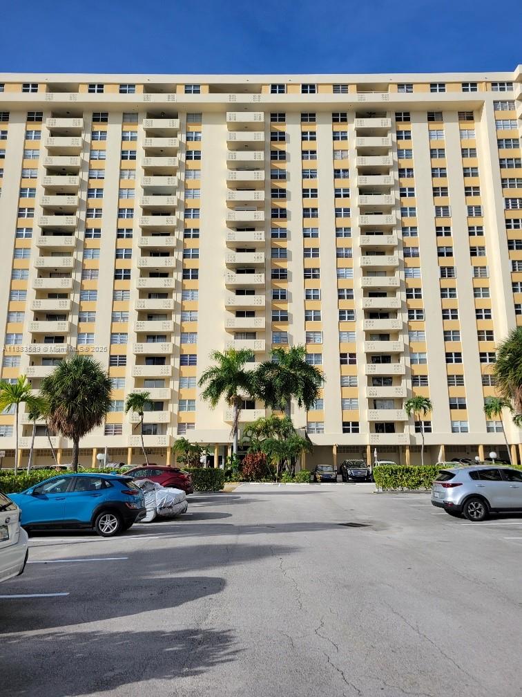 1833 South Ocean Drive, Unit 307 Hallandale Beach, FL 33009 - Photo 1 of 19 front view of a building with a street