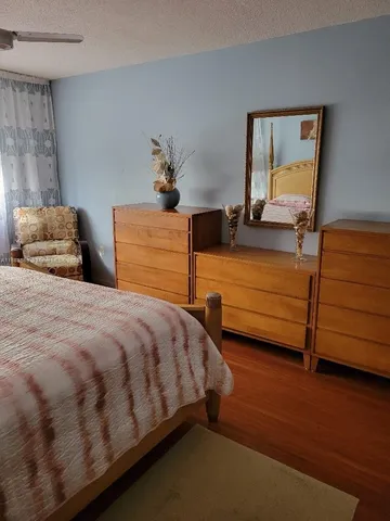 a bathroom with a sink a mirror and shower