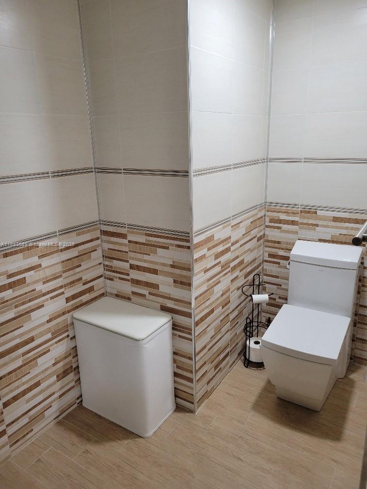 1833 South Ocean Drive, Unit 307 Hallandale Beach, FL 33009 - Photo 15 of 19 a view of a room with racks on the wall