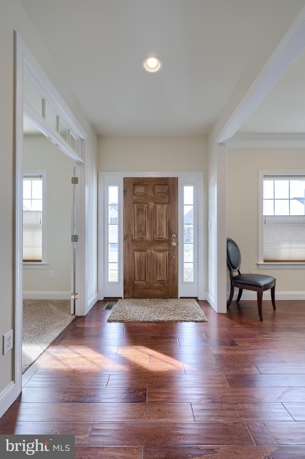 640 Warminster Lane Lititz, PA 17543 - Photo 3 of 57 a view of a livingroom with wooden floor and furniture