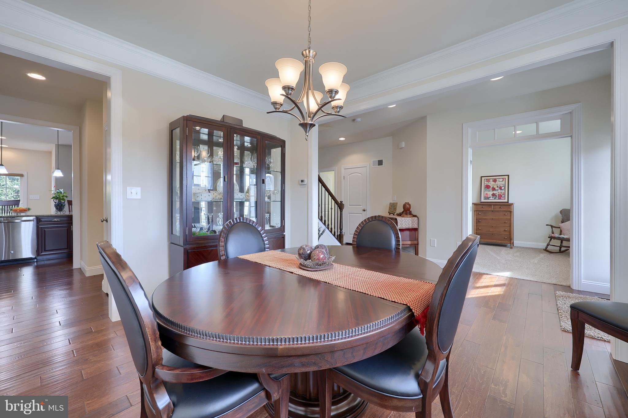 640 Warminster Lane Lititz, PA 17543 - Photo 9 of 57 a dining room with furniture and wooden floor