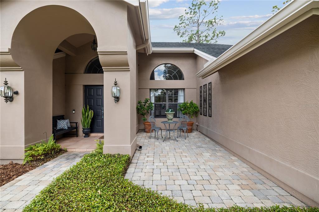 3372 Brian Road South Palm Harbor, FL 34685 - Photo 5 of 45 a front view of a house with garden