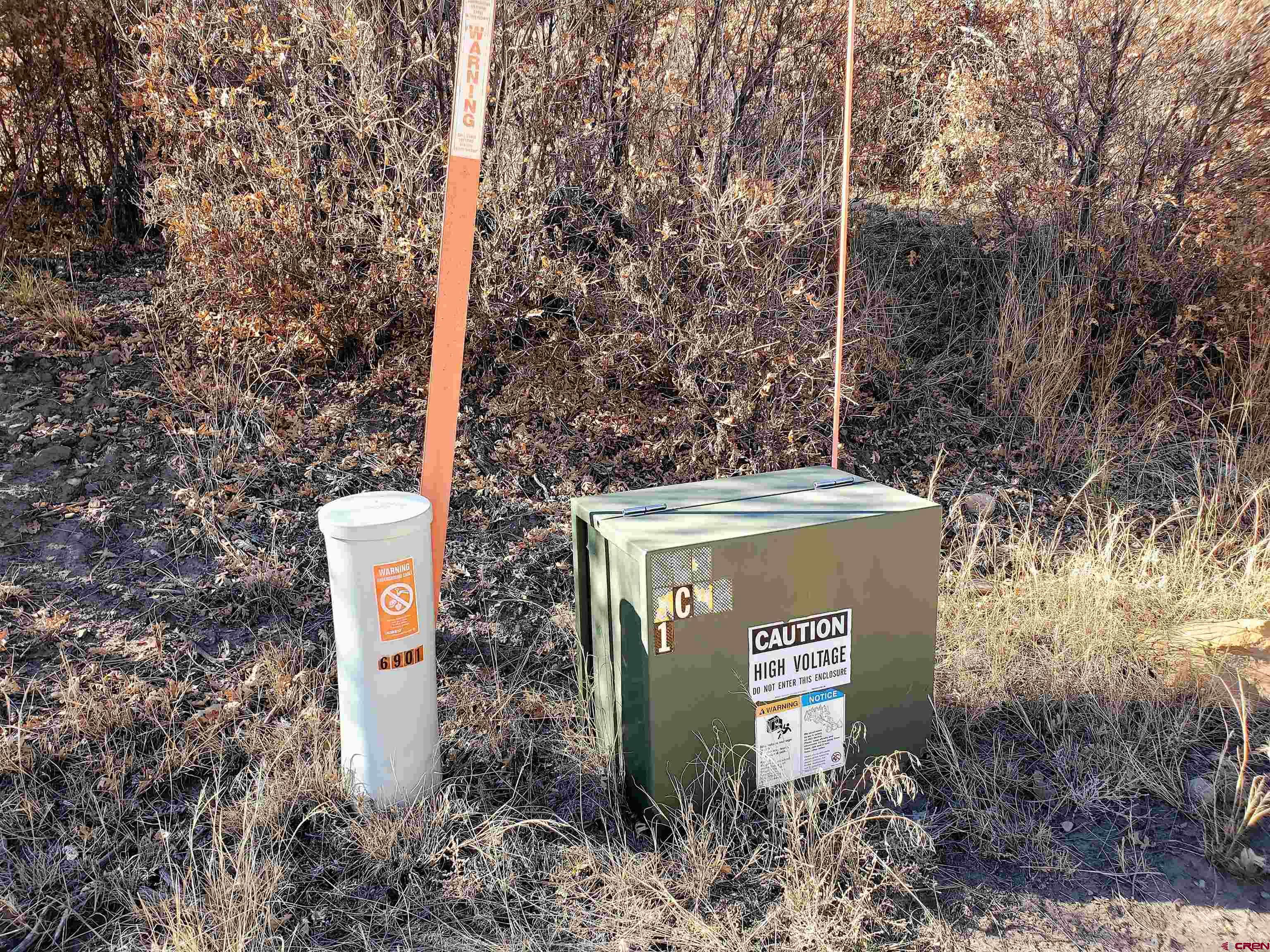 6727 Road 46 Mancos, CO 81328 - Photo 24 of 24 a sign that is on the side of the road