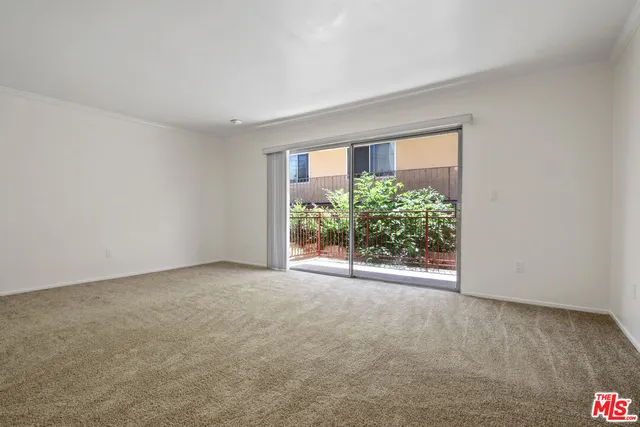 a bathroom with a granite countertop sink a mirror and a bathtub