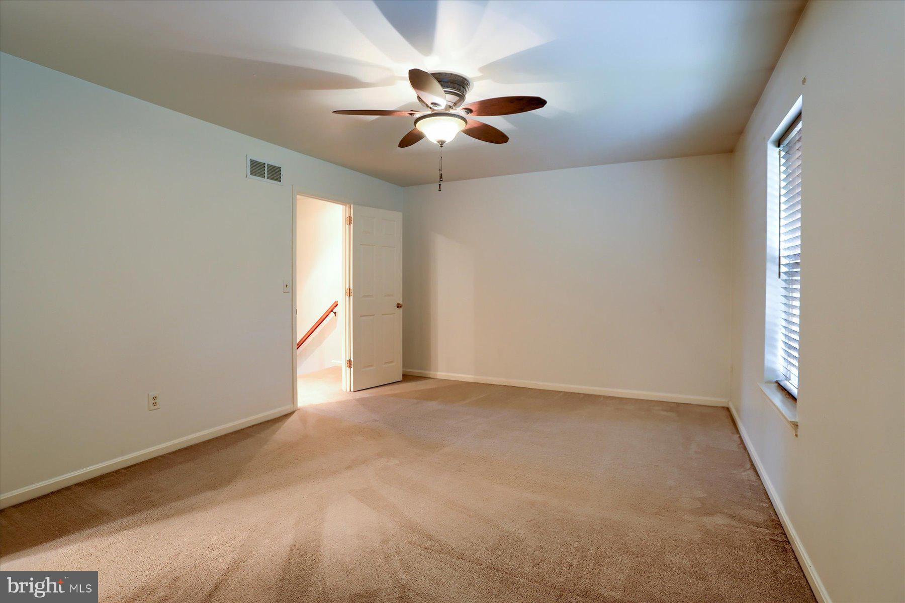 802 Cambridge Court Palmyra, PA 17078 - Photo 15 of 32 an empty room with fan and windows