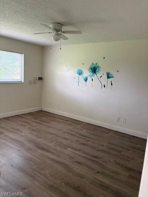 5651 Rattlesnake Hammock Road, Unit C108 Naples, FL 34113 - Photo 8 of 14 wooden floor in an empty room