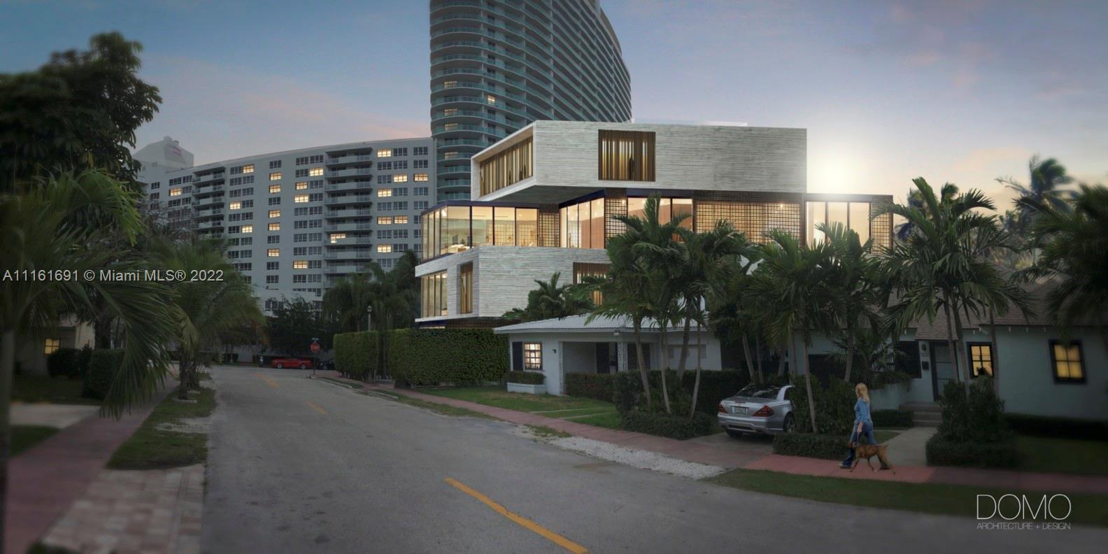 1445 Bay Road Miami Beach, FL 33139 - Photo 2 of 11 a front view of a house with yard and tree s