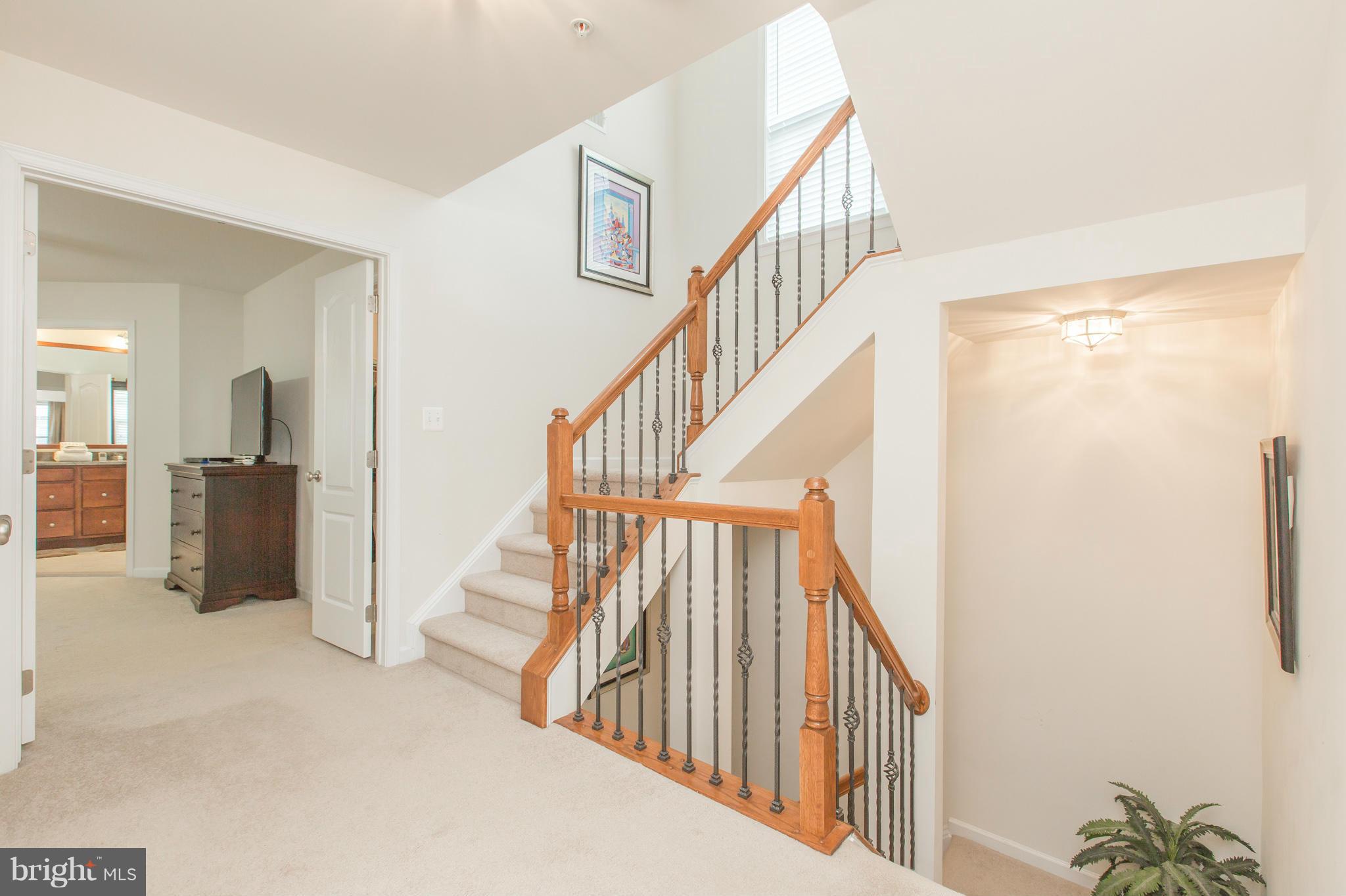 4020 Ranch Road Upper Marlboro, MD 20772 - Photo 23 of 30 Third Level Stairway leading to 4th level loft