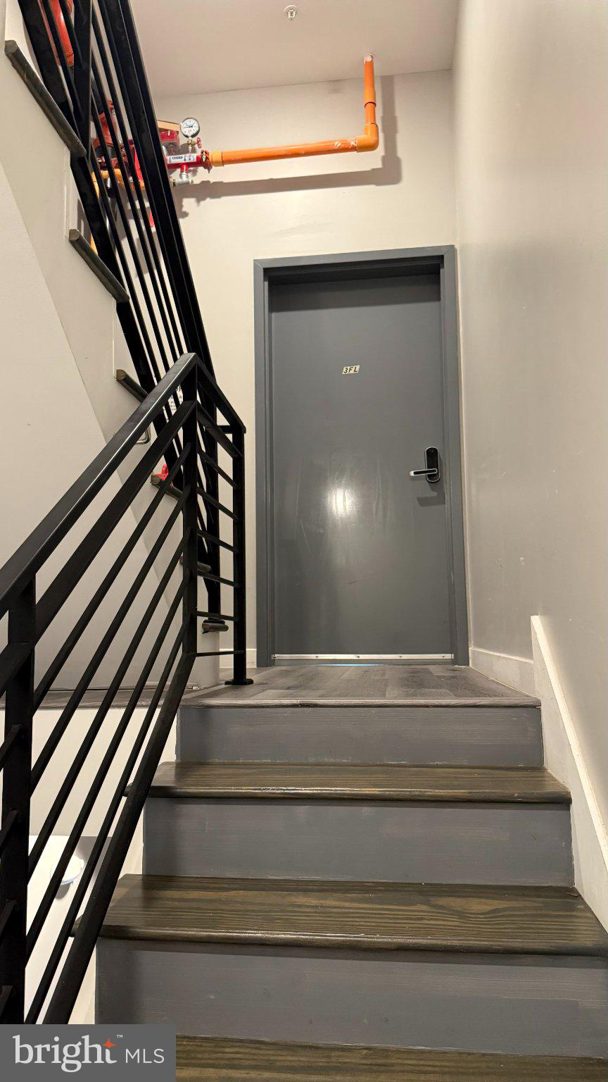 1621 Ridge Avenue Philadelphia, PA 19130 - Photo 12 of 14 Modern stairway leading to a door.