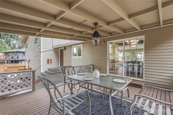 a outdoor dining space with furniture