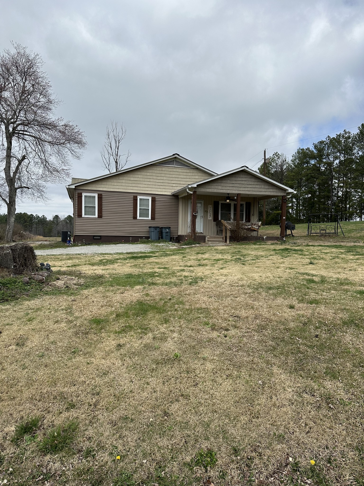 5235 Roby Road Enville, TN 38332 - Photo 3 of 39 a house with trees in the background