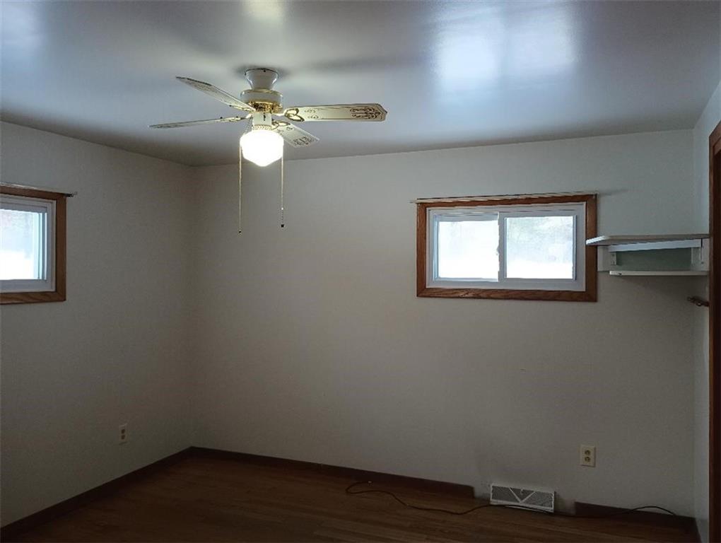 234 Baker Road Greenville, PA 16125 - Photo 15 of 16 wooden floor in an empty room with a window