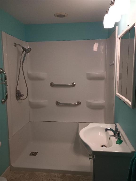 234 Baker Road Greenville, PA 16125 - Photo 16 of 16 a bathroom with a sink and mirror