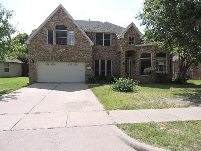 2011 Glen Manor Road Corinth, TX 76208 - Photo 1 of 1 a front view of a house with garden