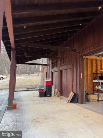 a view of backyard with tub