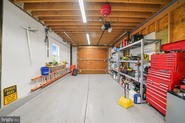a bedroom with a bed and furniture