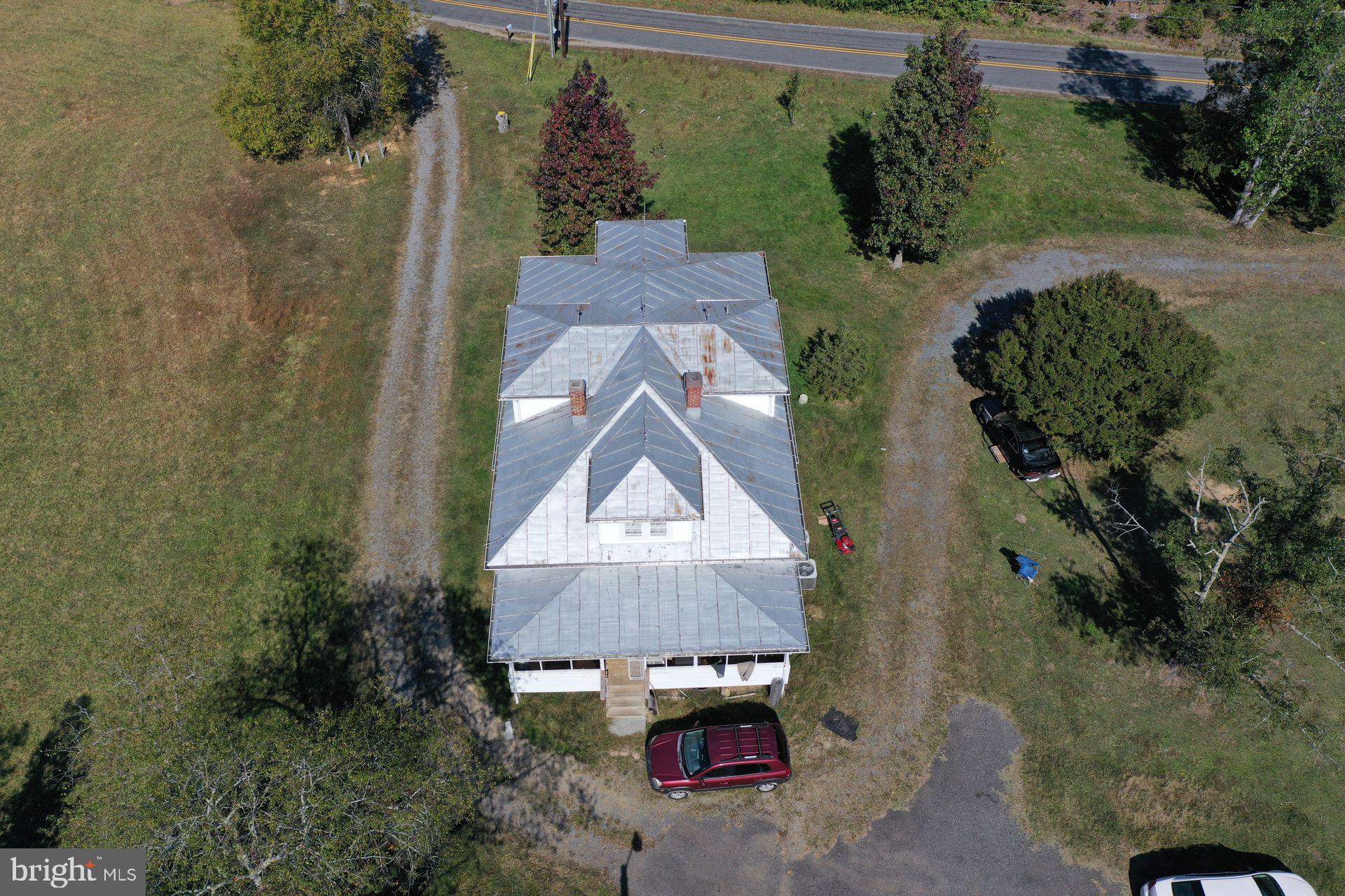 13363 Shiloh Loop King George, VA 22485 - Photo 4 of 14 an aerial view of a house with a yard and garden