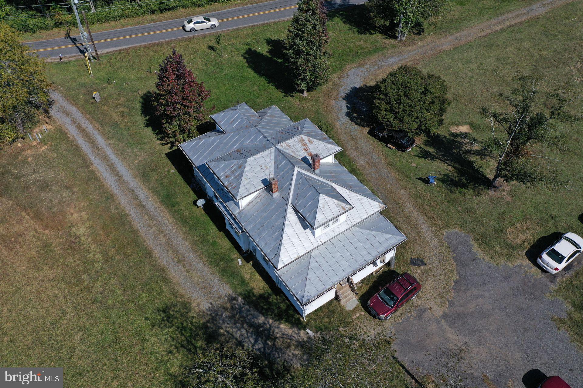 13363 Shiloh Loop King George, VA 22485 - Photo 5 of 14 an aerial view of a house with a yard