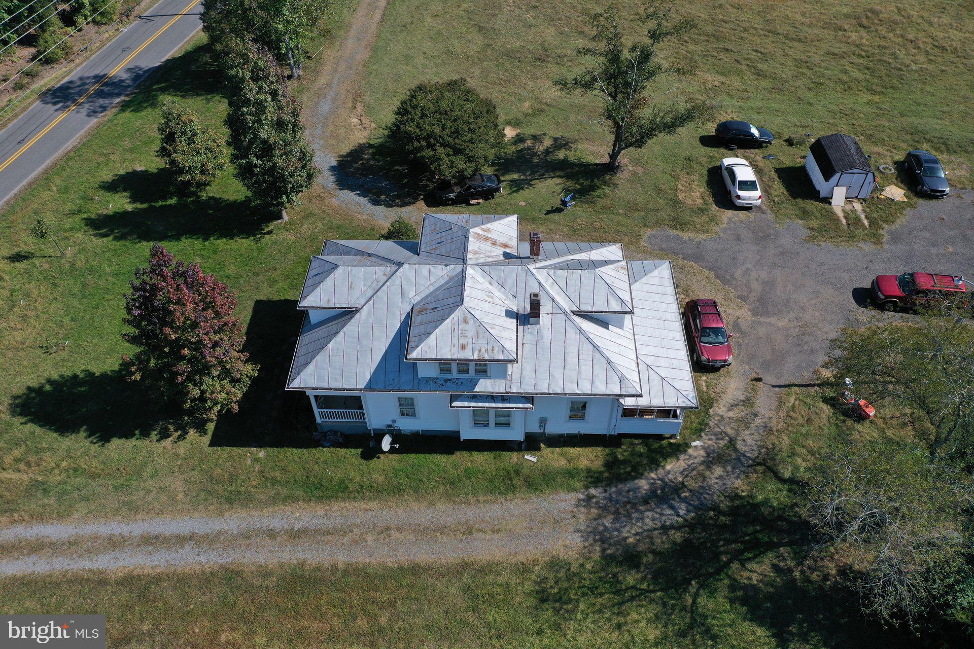 13363 Shiloh Loop King George, VA 22485 - Photo 6 of 14 an aerial view of a house with a yard and lake view