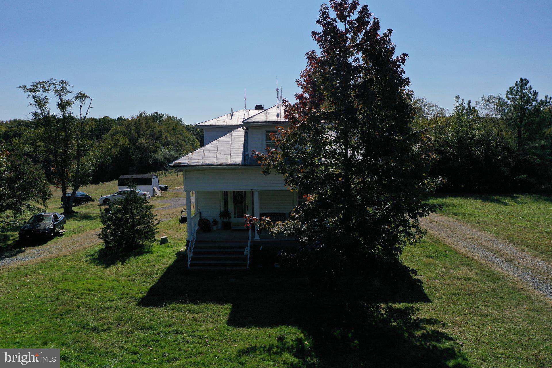 13363 Shiloh Loop King George, VA 22485 - Photo 10 of 14 a front view of a house with a yard