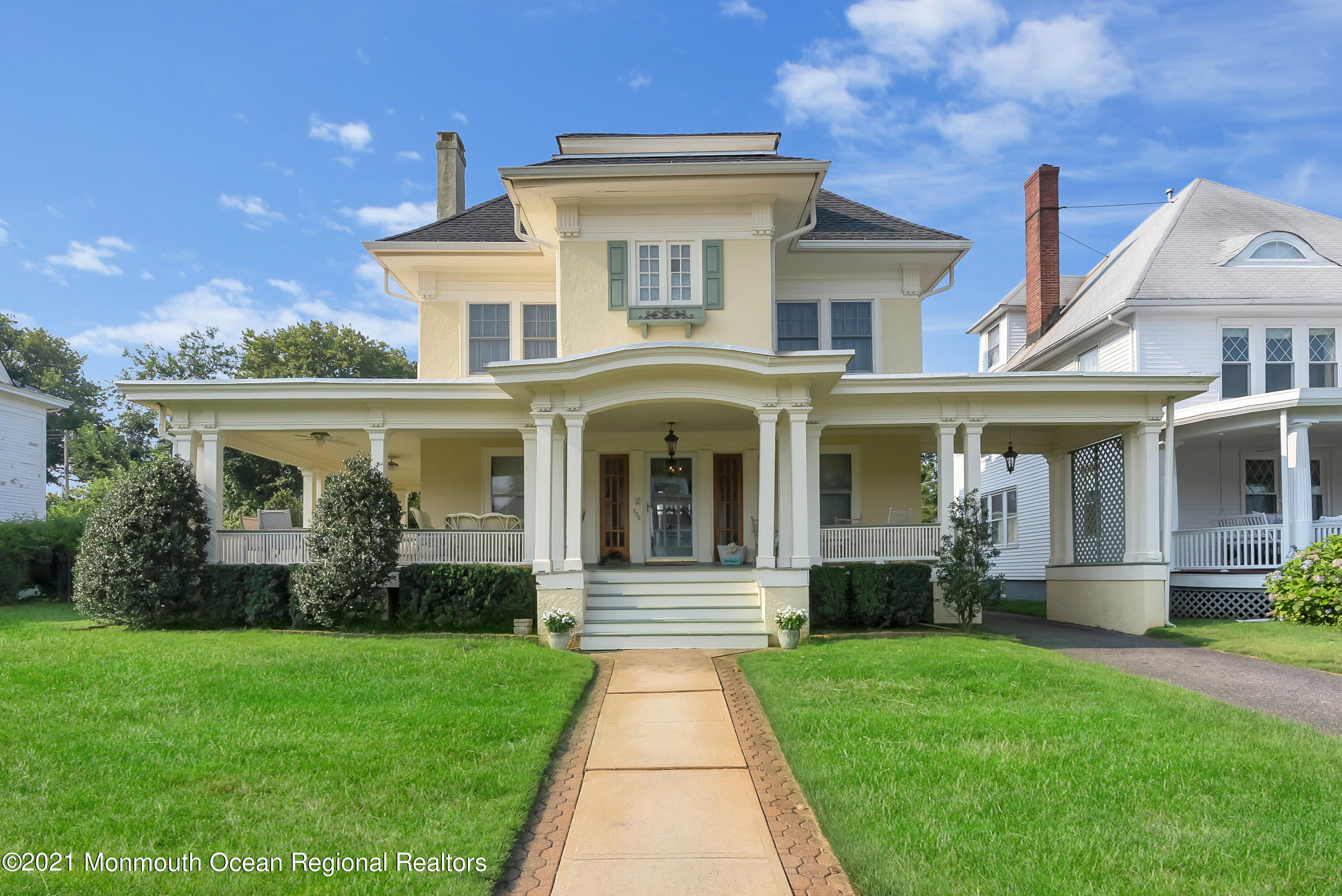 236 Allen Avenue Allenhurst, NJ 07711 - Photo 1 of 46 a front view of a house with garden