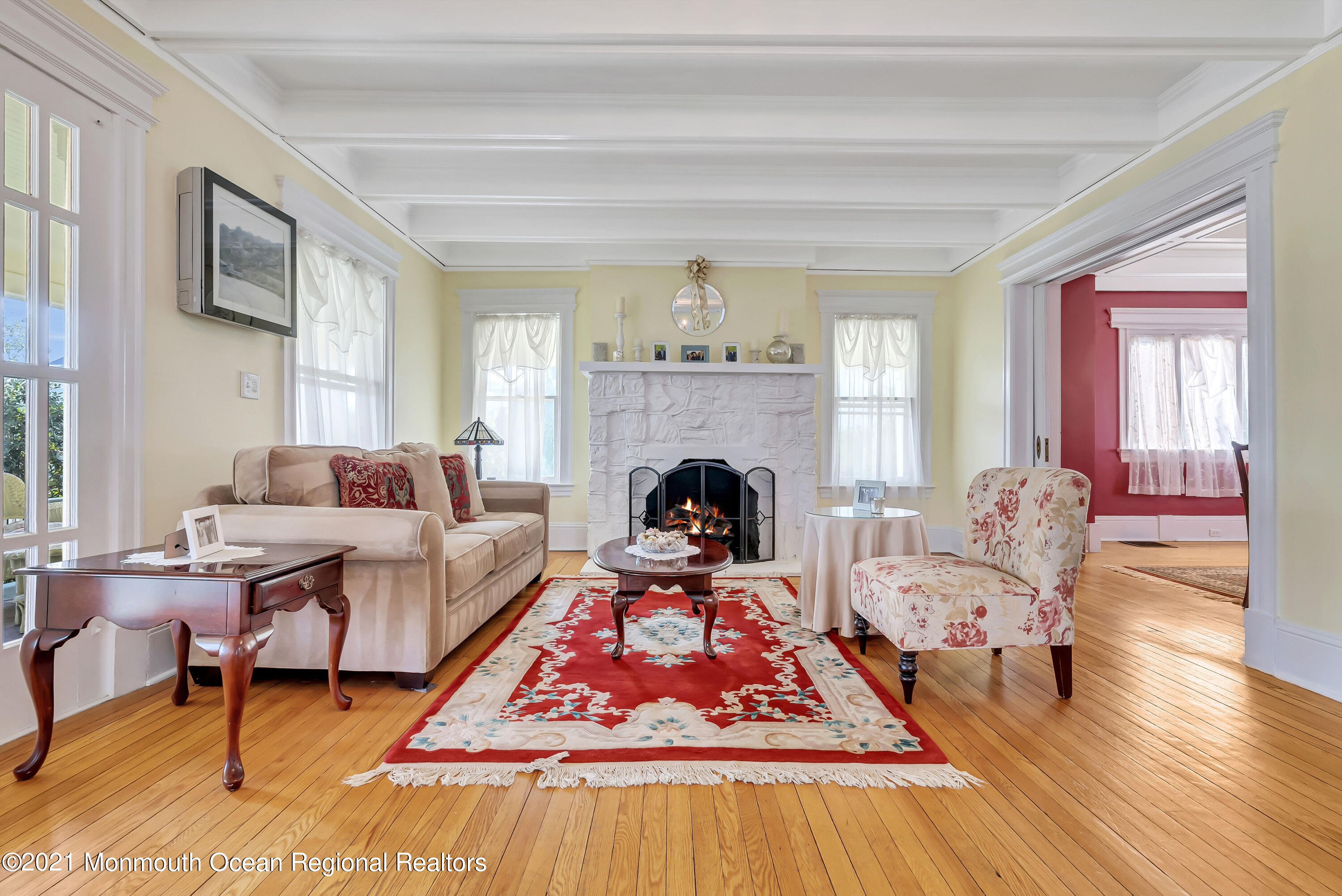 236 Allen Avenue Allenhurst, NJ 07711 - Photo 14 of 46 a living room with furniture and a fireplace
