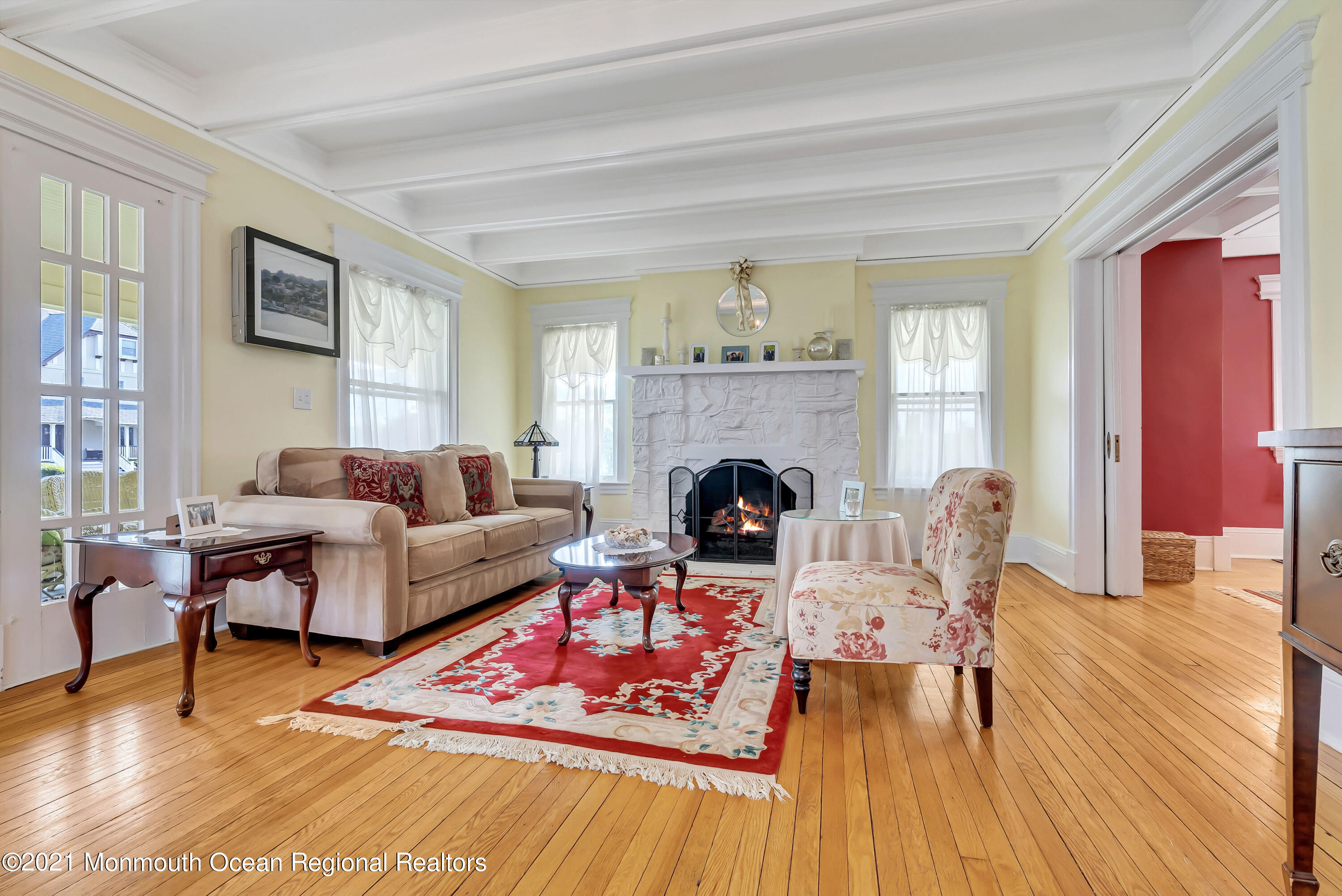 236 Allen Avenue Allenhurst, NJ 07711 - Photo 15 of 46 a living room with furniture and a fireplace
