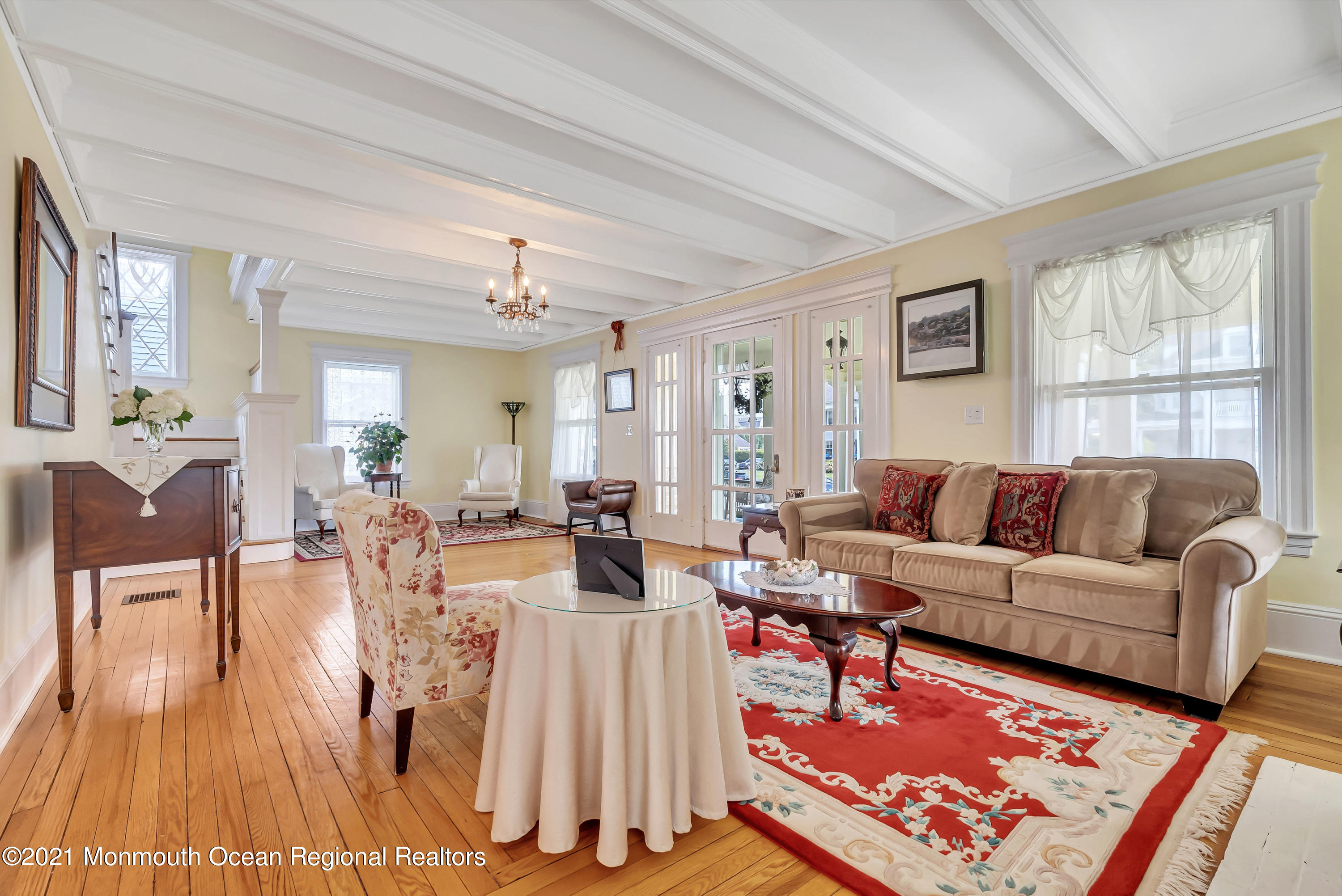 236 Allen Avenue Allenhurst, NJ 07711 - Photo 18 of 46 a living room with furniture a rug and a window
