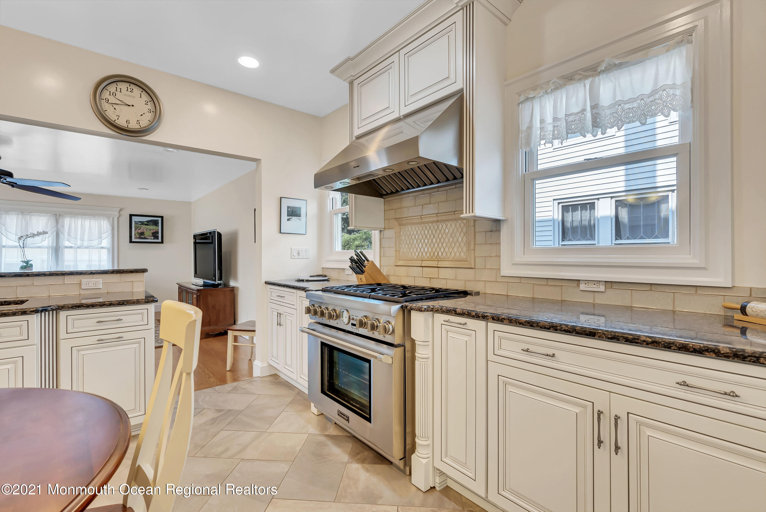 236 Allen Avenue Allenhurst, NJ 07711 - Photo 27 of 46 a kitchen with stainless steel appliances granite countertop a stove and a sink