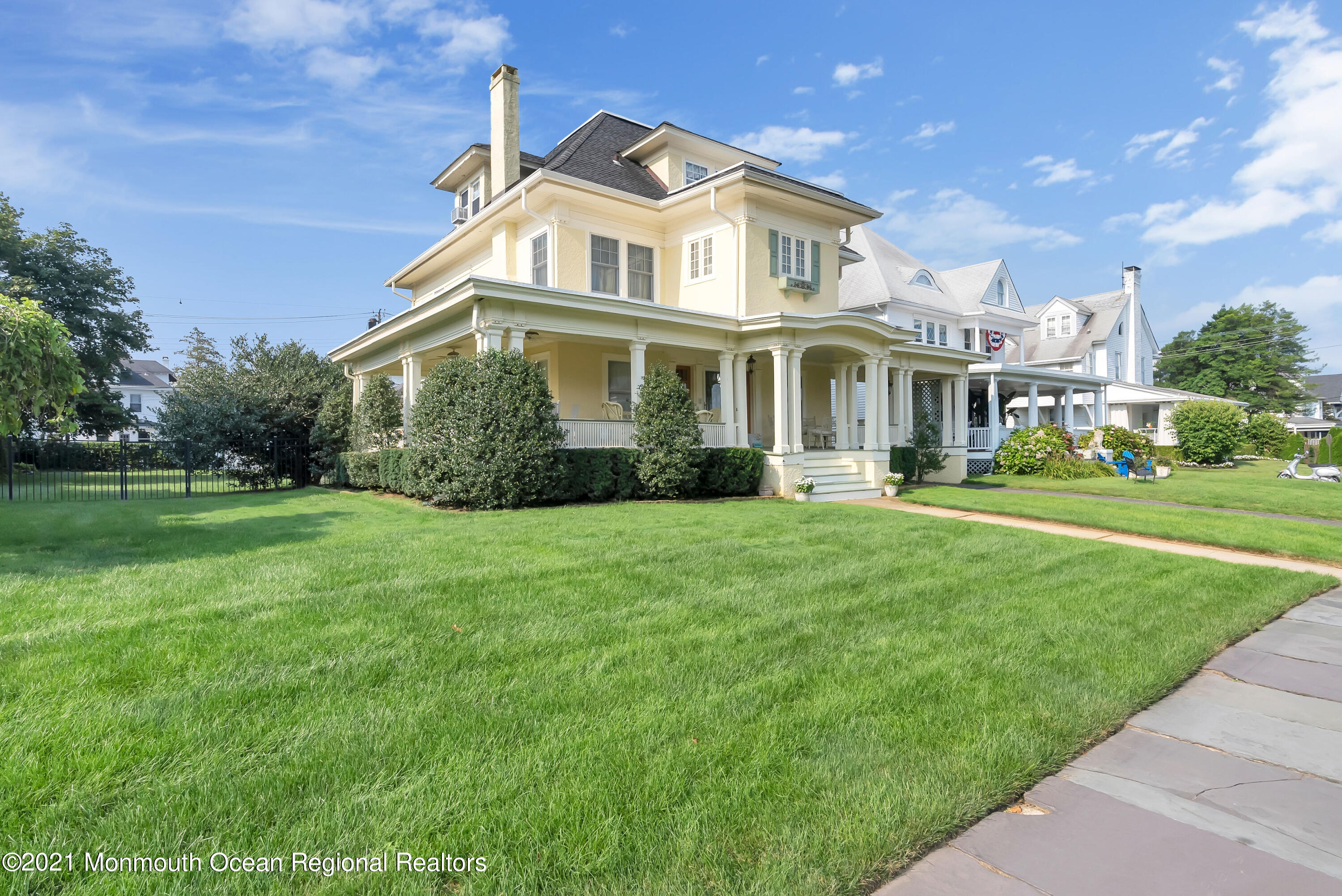 236 Allen Avenue Allenhurst, NJ 07711 - Photo 4 of 46 a front view of a house with a garden