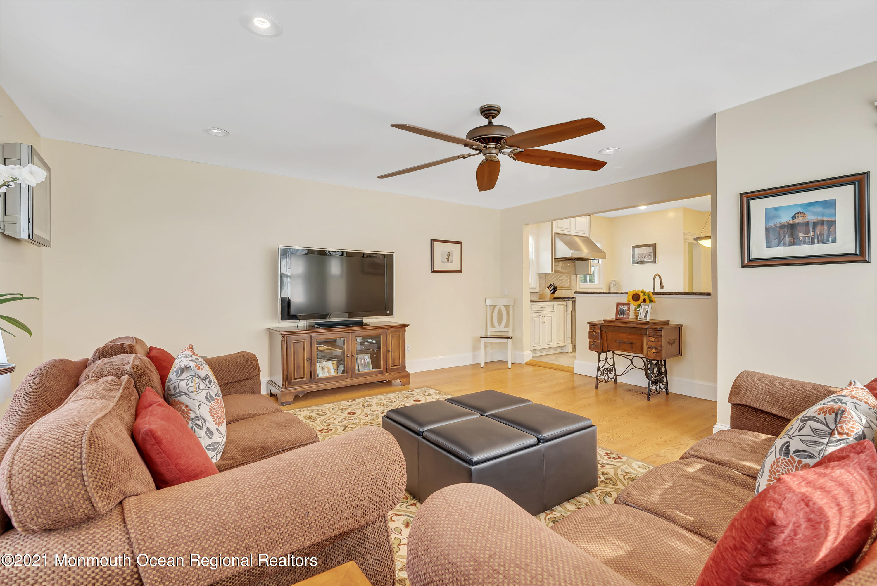 236 Allen Avenue Allenhurst, NJ 07711 - Photo 31 of 46 a living room with furniture and a flat screen tv