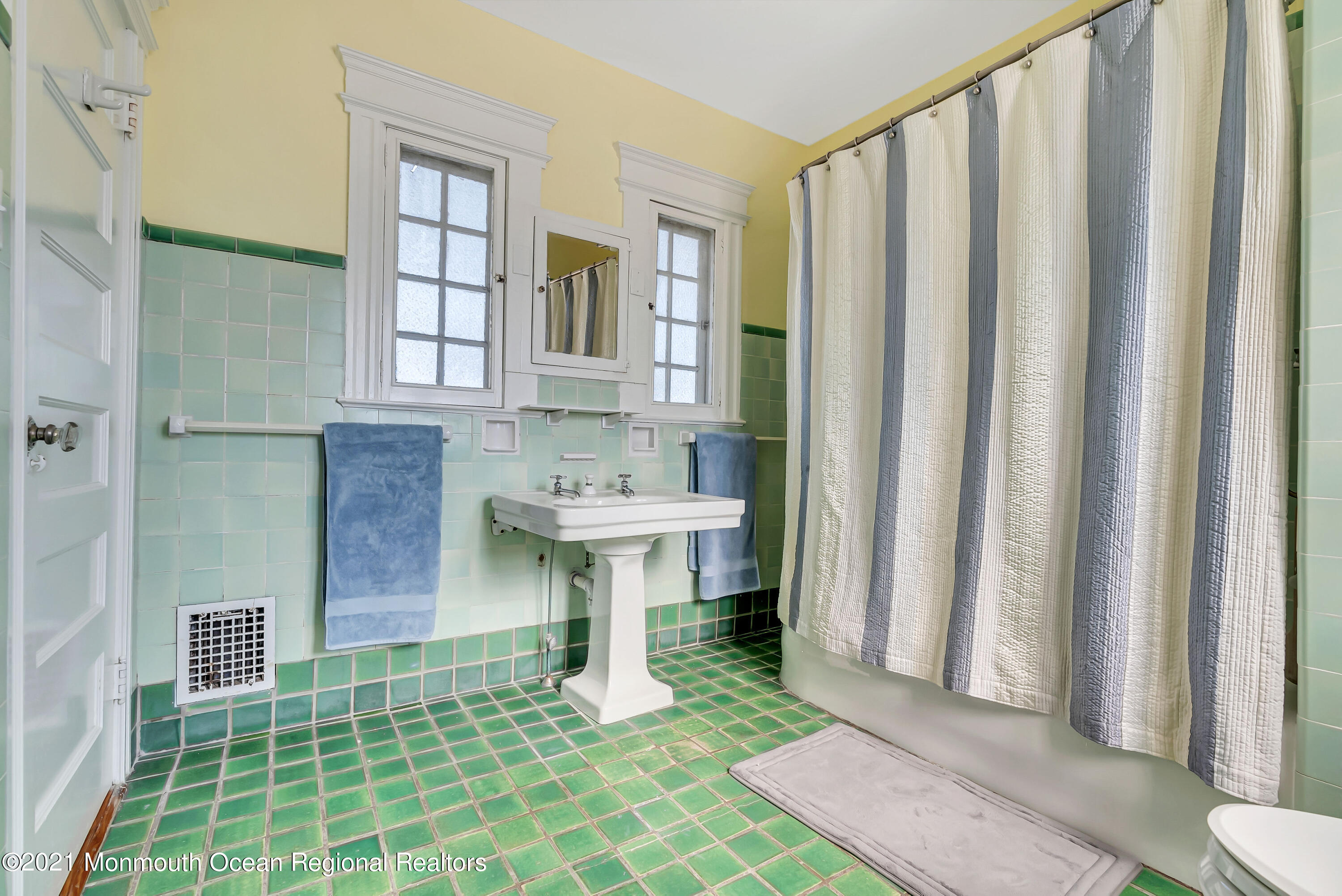 236 Allen Avenue Allenhurst, NJ 07711 - Photo 33 of 46 a bathroom with a sink a toilet and shower
