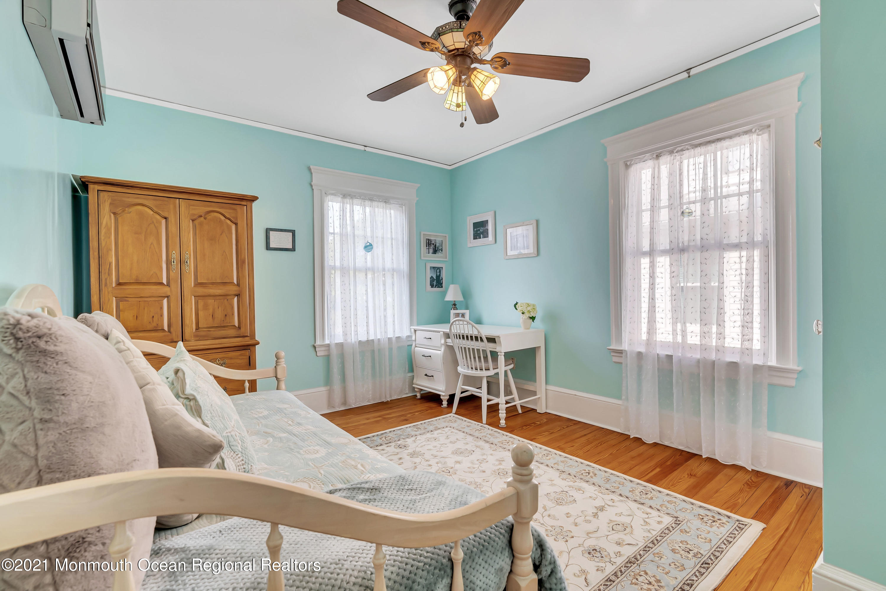 236 Allen Avenue Allenhurst, NJ 07711 - Photo 34 of 46 a living room with furniture and a wooden floor