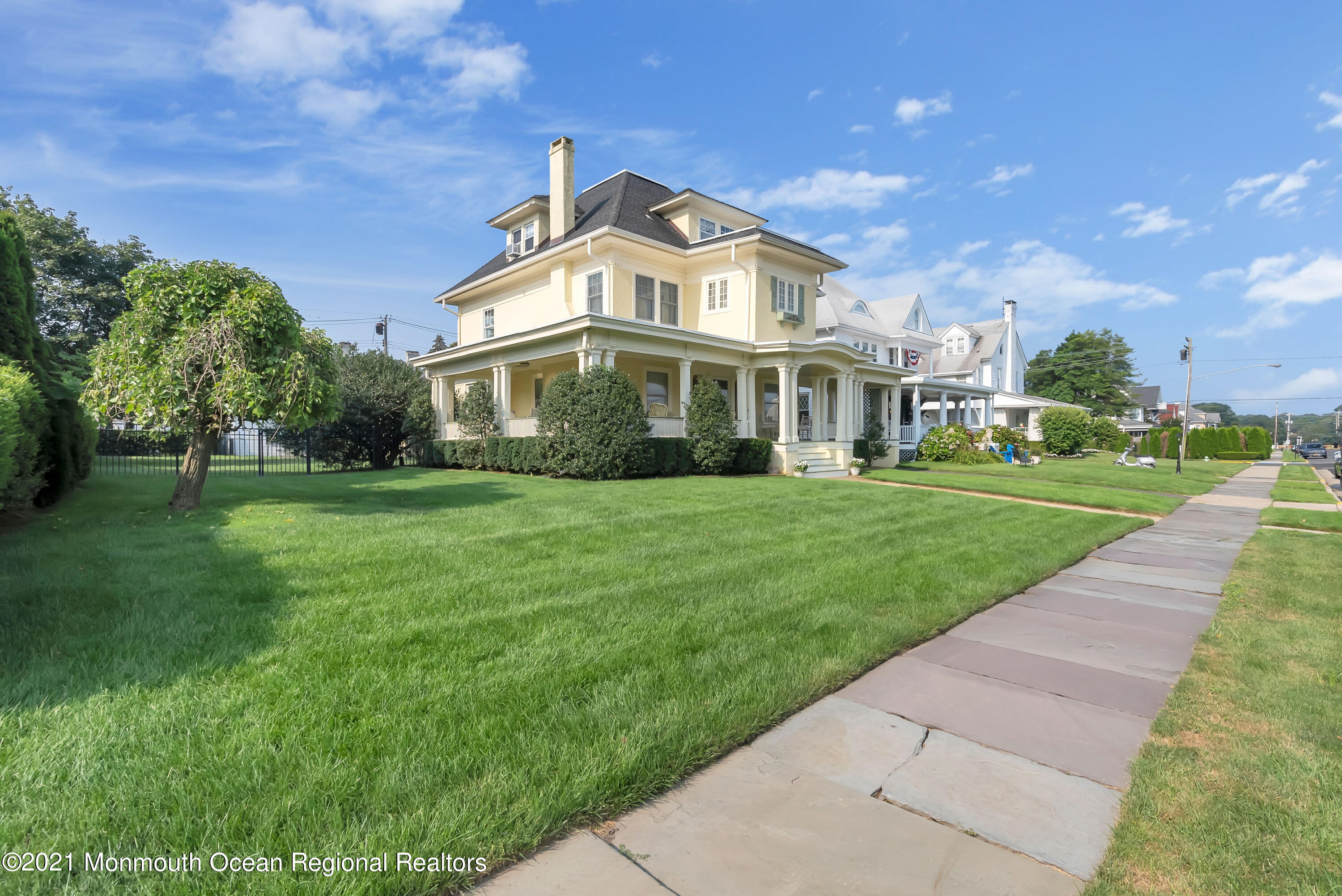 236 Allen Avenue Allenhurst, NJ 07711 - Photo 5 of 46 a front view of a house with a yard