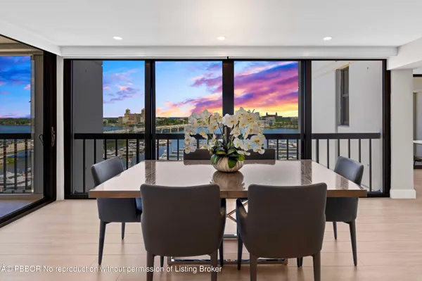 a living room with furniture and a table