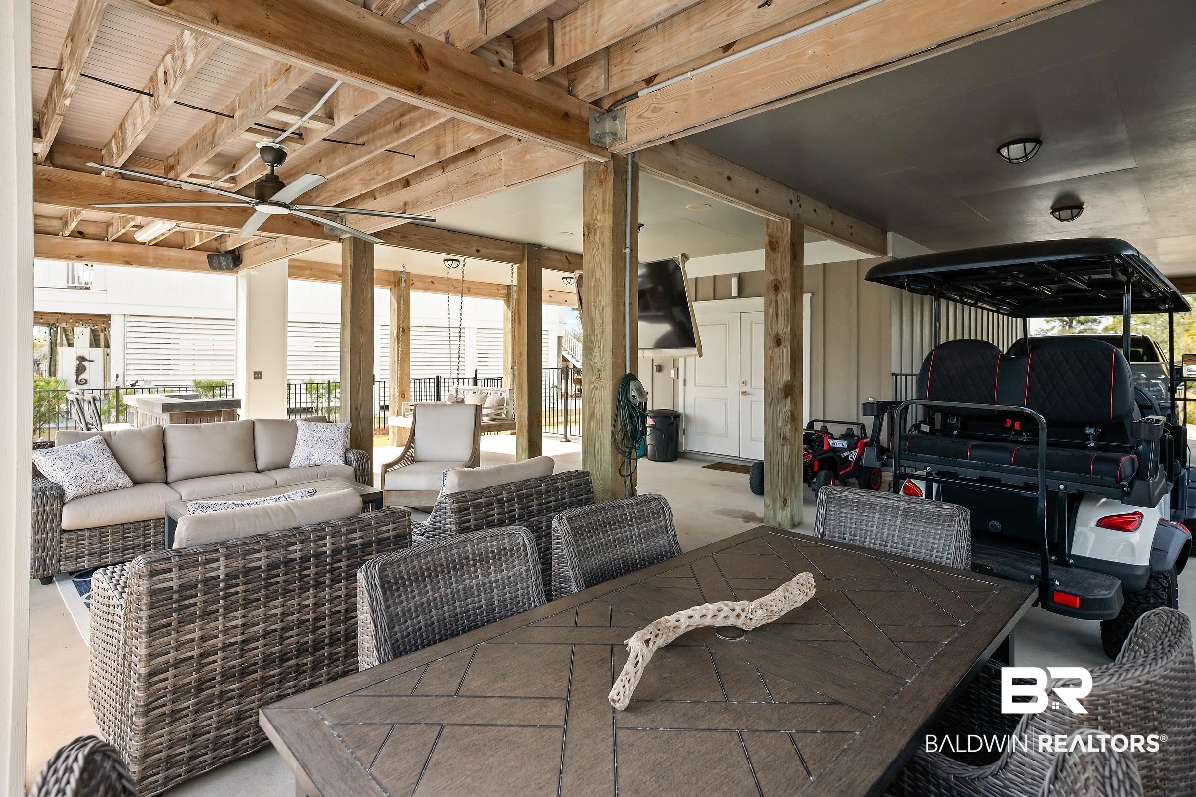 33186 Marlin Key Drive Orange Beach, AL 36561 - Photo 75 of 87 View of patio featuring an outdoor living / dining area and a ceiling fan