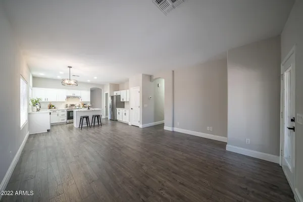 a view of an empty room and window