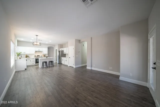 a view of an empty room and window
